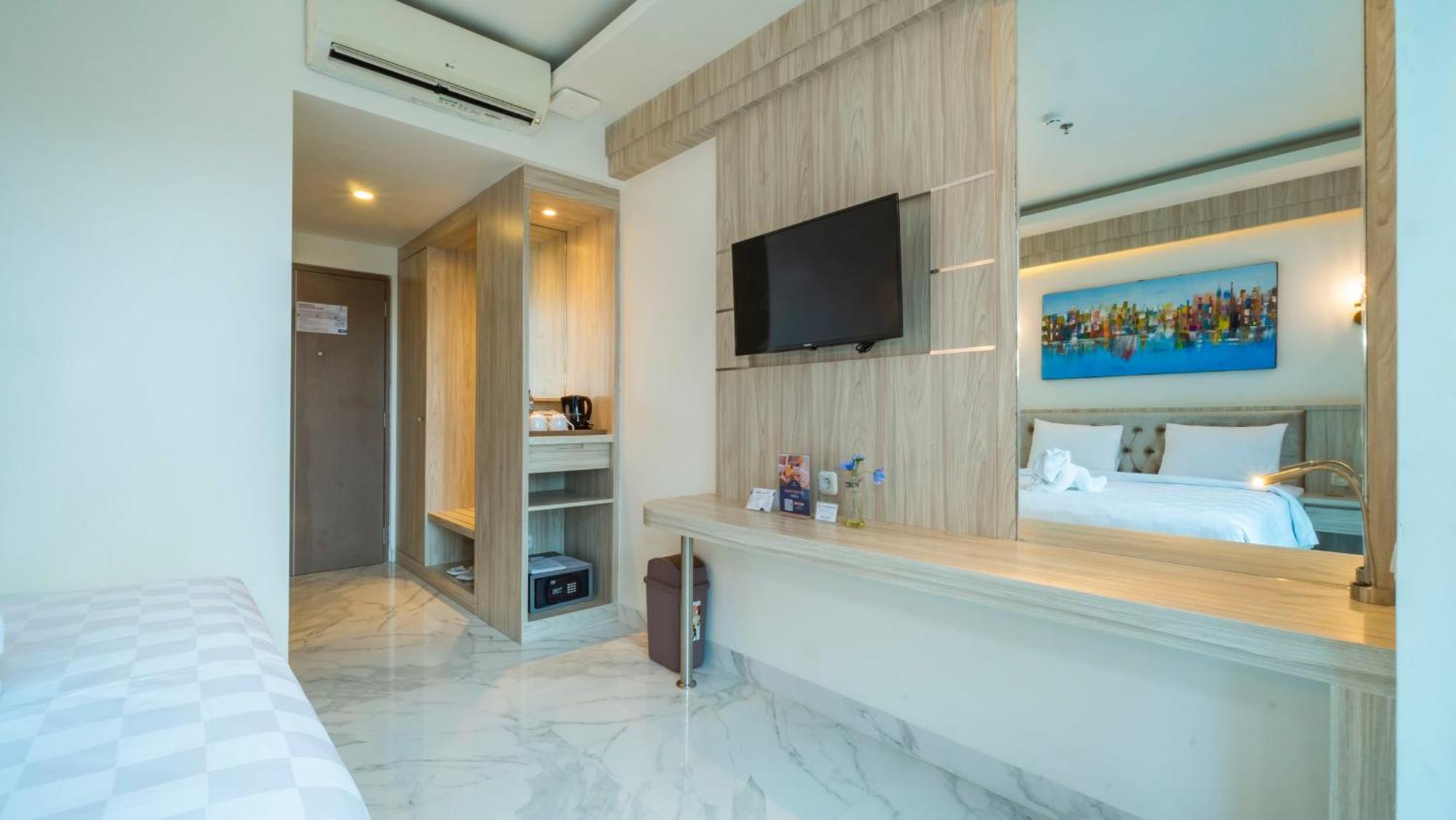City Of Aventus Hotel - Denpasar Номер фото